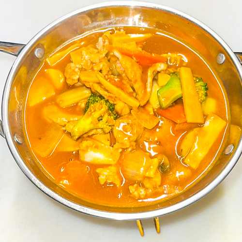 Porc au curry rouge et lait de coco